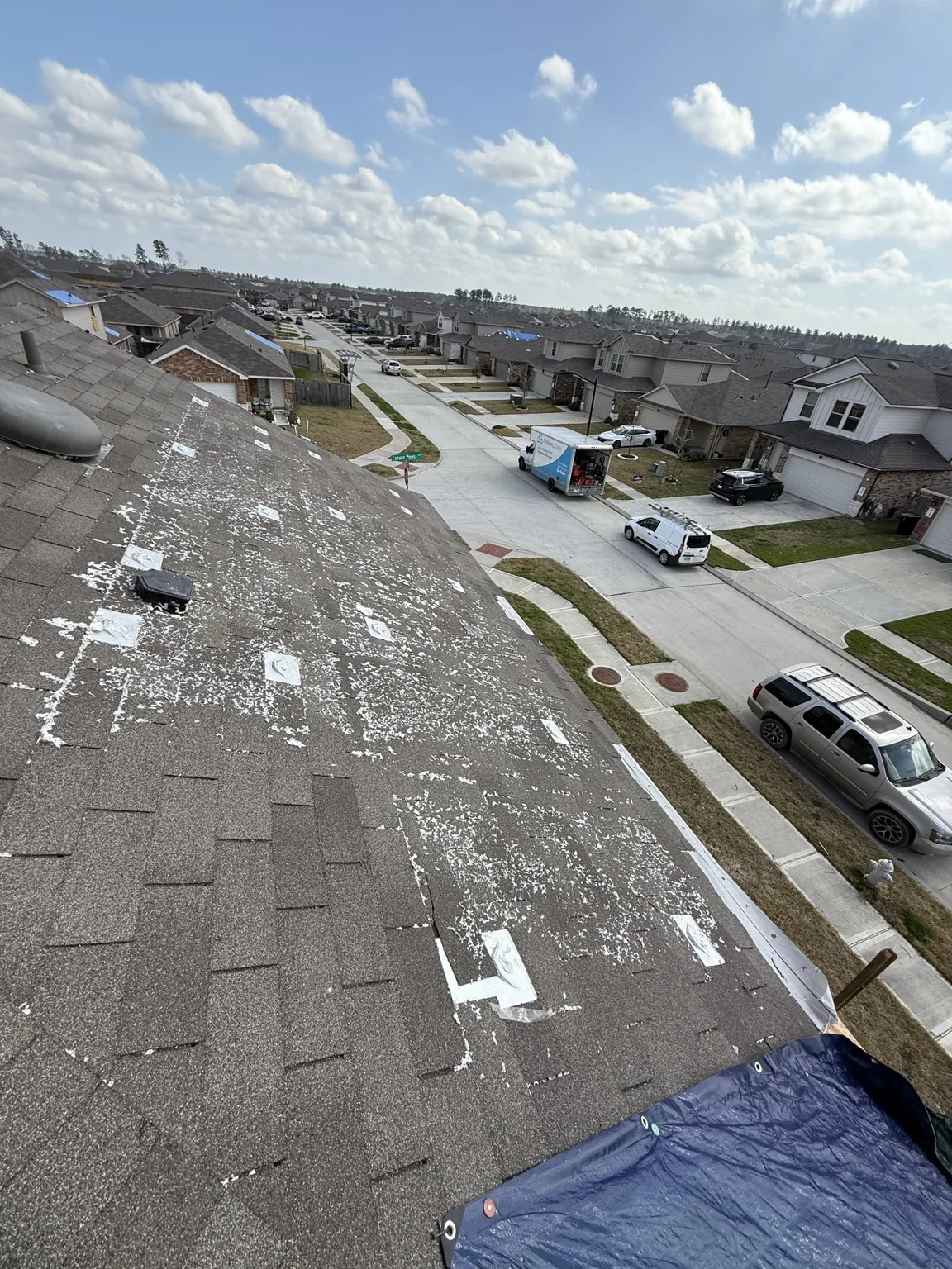 Exposed mounting points on a roof section without solar panels